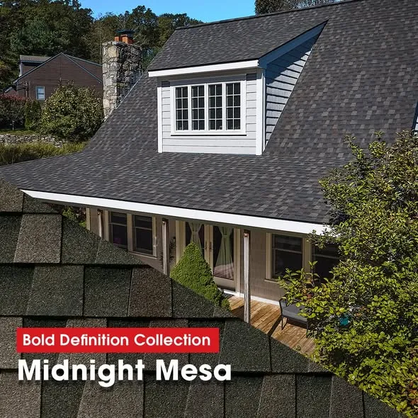 A dormered home roofed in GAF Bold Definition Collection shingles in Midnight Mesa.