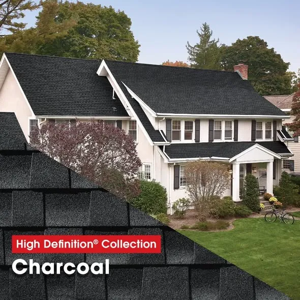 A white colonial home roofed in GAF High Definition Collection shingles in Charcoal.